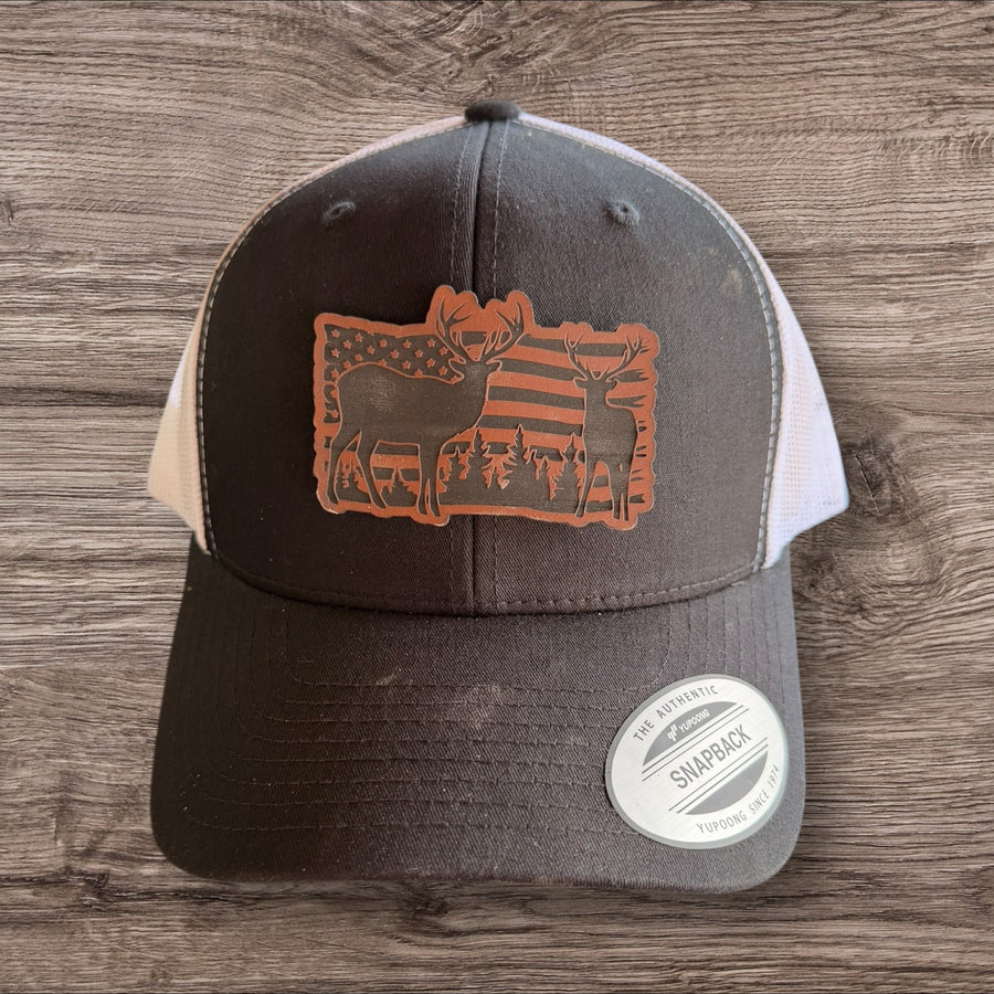 Patriotic Whitetail Deer Leather Patch Trucker Hat – Yupoong Snapback